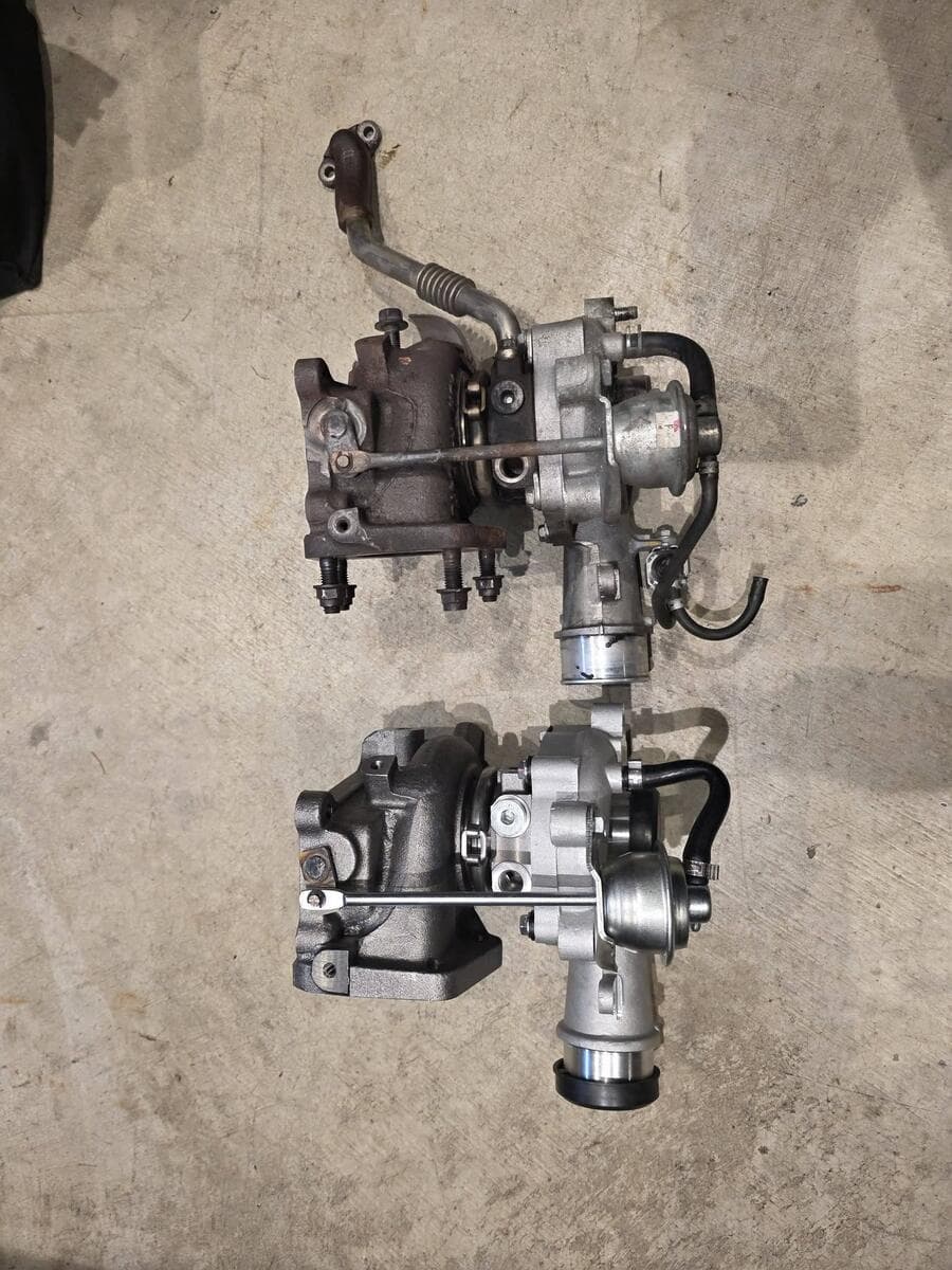 Old turbo beside the new one before the swap
